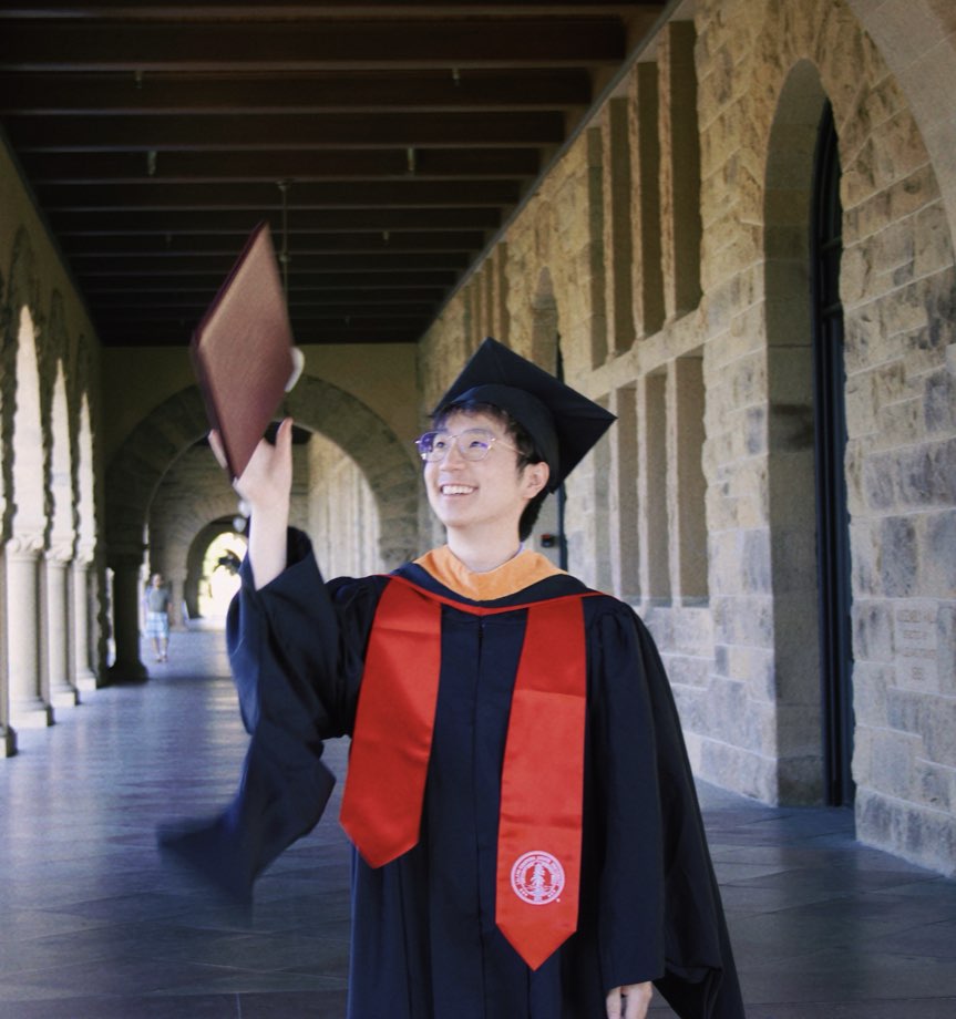 Samuel Yip in cap and gown at his Stanford graduation